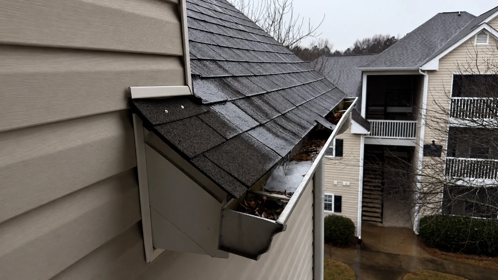Commercial gutter services in Santa Barbara — box gutter maintenance on a downtown storefront building