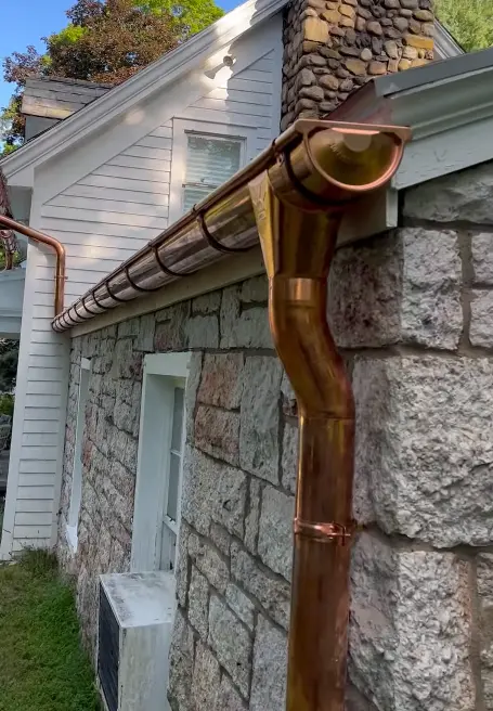 Copper gutter installation on a Spanish Colonial home in Santa Barbara