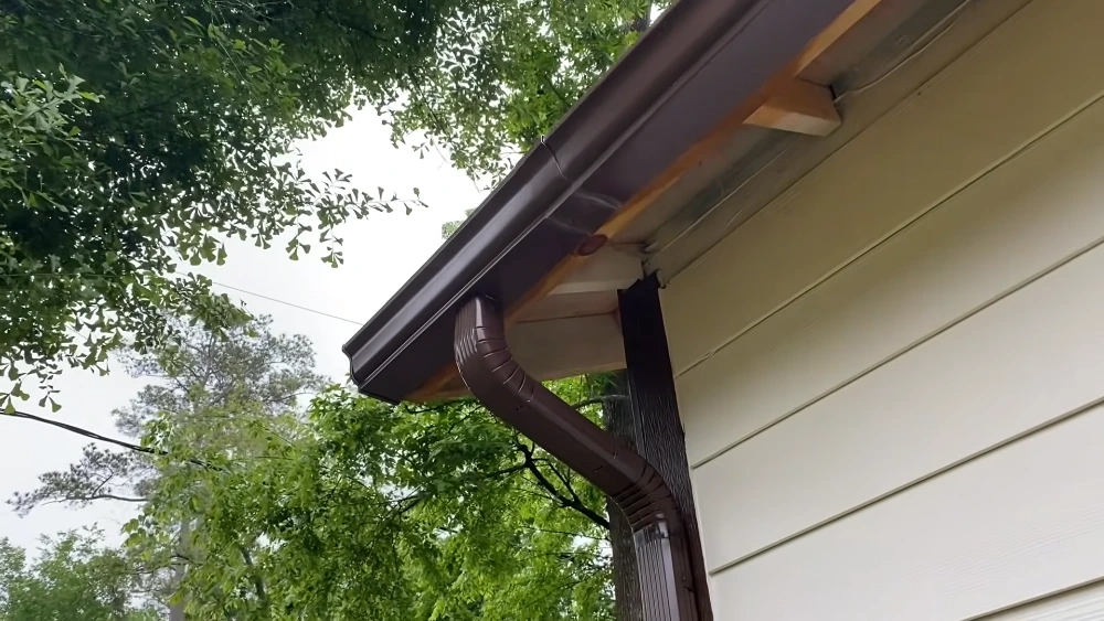 Gutter replacement in Santa Barbara — old corroded gutter removed ahead of a new seamless install